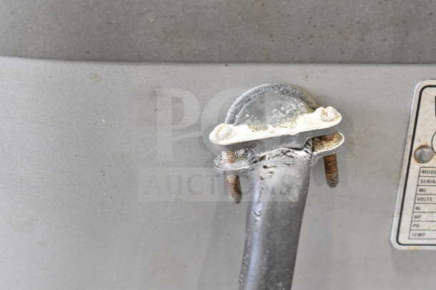 Hobart P660 mixer detail showing cord attachment and wear, includes label with model and voltage info.