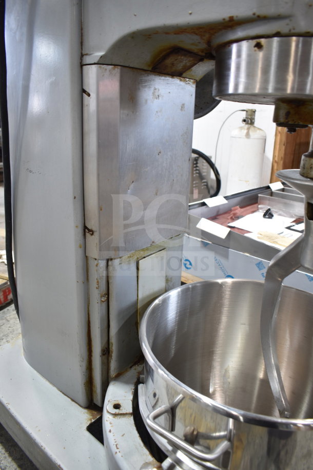 Hobart P660 60-quart dough mixer with mixing bowl and dough hook attachment, commercial use, visible wear.