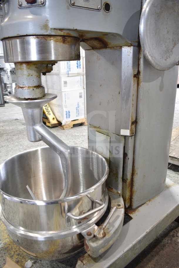 Hobart P660 60-quart commercial dough mixer with bowl and hook, showing signs of wear. 208-240V, 3-phase.