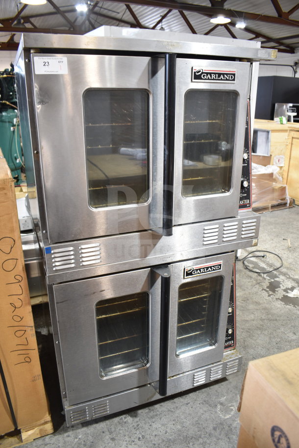 Garland Master 200 commercial convection ovens with view-through doors, thermostatic controls, and casters.