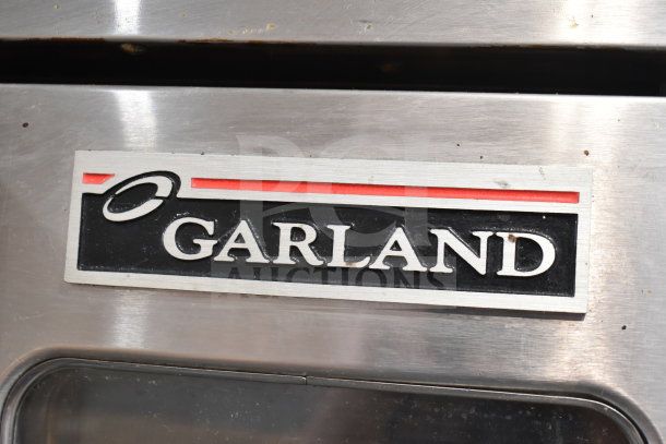 Garland Master 200 commercial convection oven label, indicating brand and model. Stainless steel finish visible.