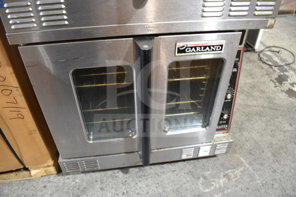 Garland Master 200 commercial convection oven, full-size, view-through doors, thermostatic controls, on casters.