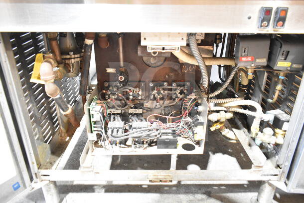 Cleveland Double Deck Pressure Steam Cabinet, electric, 480V, 3-phase. Internal wiring and components visible.