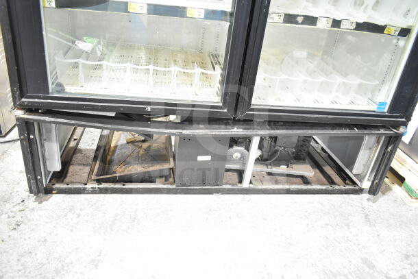 True Commercial 2 Door Reach In Cooler Merchandiser, black frame, visible interior shelves, operational, 115V, 1 Phase.