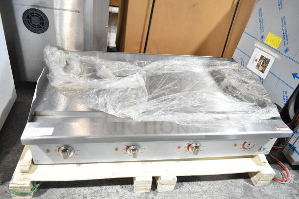 BRAND NEW Cooking Performance Group G-CPG-48-M 48" electric countertop griddle, 208/240V, wrapped in plastic, with minor scratches.