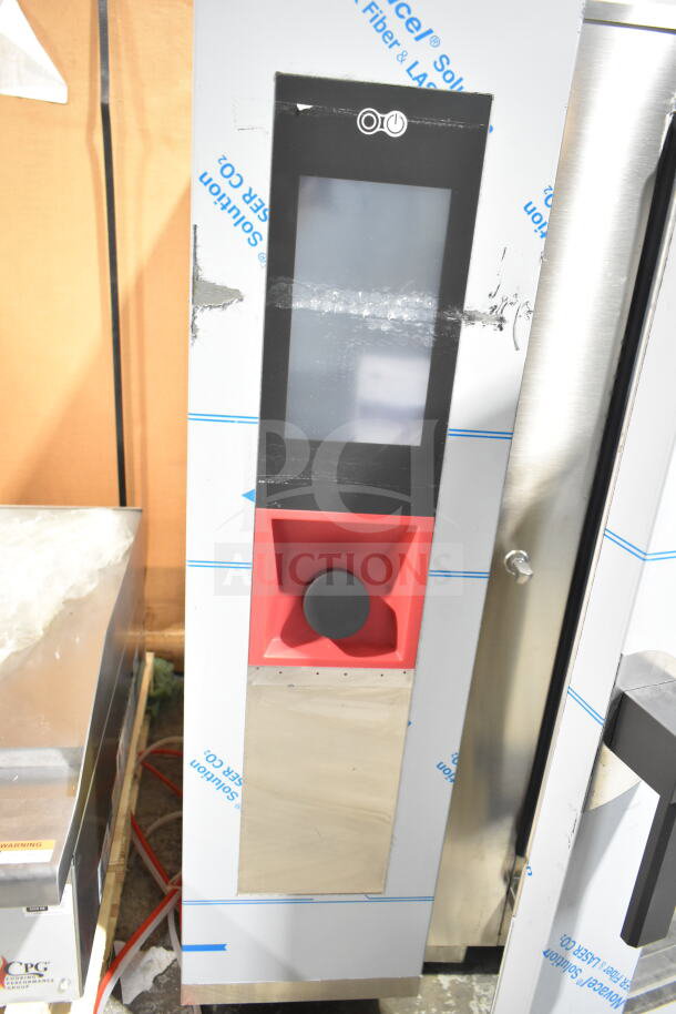 Brand new Blodgett AETE101R stainless steel combi oven, 208V, 3 phase, with scratch and dent, touchscreen, and control knob.