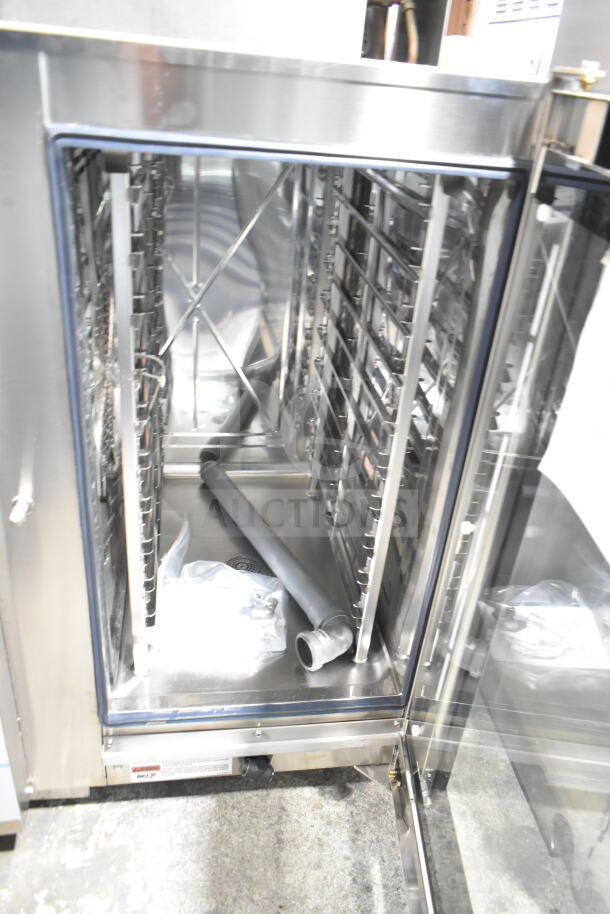 Brand new Blodgett AETE101R stainless steel combi convection oven, electric, 208V, 3 phase, interior view.