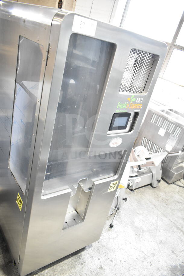 LATE MODEL JBT 2ND-GEN-MFJ-HE Fresh N Squeeze citrus juicer, floor style, on commercial casters, missing back left caster.