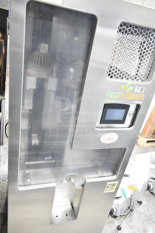 LATE MODEL JBT 2ND-GEN-MFJ-HE Citrus Juicer, commercial floor style, missing back left caster. 115V, 1 Phase.