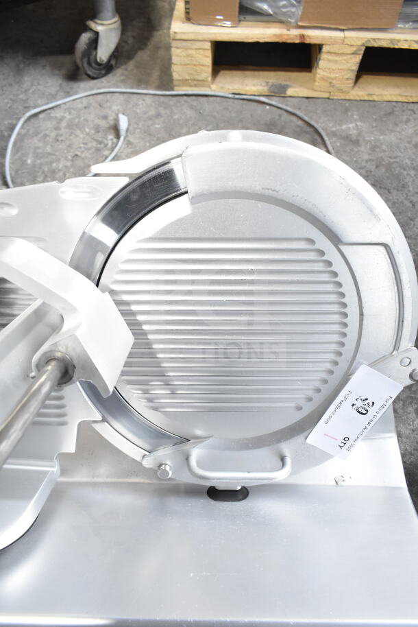 2017 Bizerba GSP HD commercial meat slicer, tabletop model, 120V, 1 phase. Visible tag with branding details. Excellent condition.
