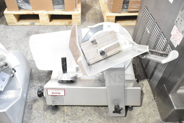 Bizerba SE 12 U commercial meat slicer, 120V, countertop model. Silver with safety guide, clean and well-maintained.