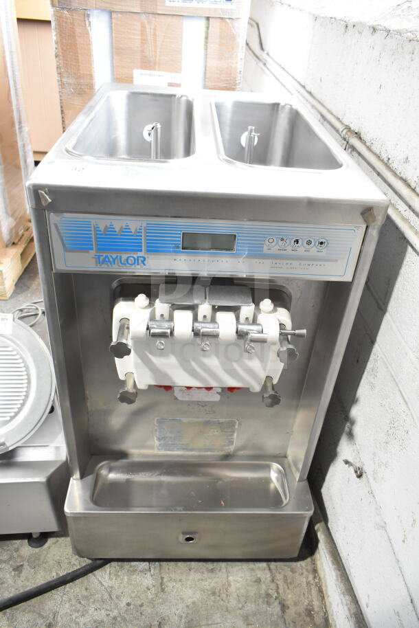 Taylor Commercial Countertop 2 Flavor Soft Serve Ice Cream Machine with Twist feature. Stainless steel. 208/240 Volts.