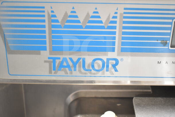 Taylor Commercial Countertop 2 Flavor Soft Serve Ice Cream Machine, stainless steel, 208/240 volts, brand logo visible.