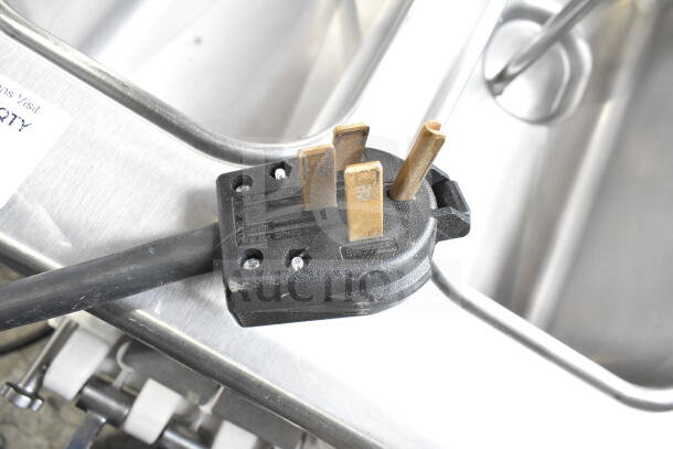 Taylor Commercial 2 Flavor Soft Serve Ice Cream Machine plug, 208/240V, sturdy design for efficient operation.