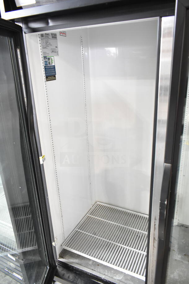 2019 True GDM-72-HC Commercial 3 Door Reach In Cooler, 115V, 1 Phase. Clean interior, label shows model and voltage.