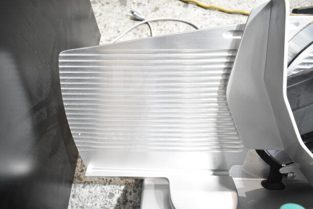 2017 Bizerba GSP H commercial meat slicer, stainless steel, 120 Volts, 1 Phase. Well-maintained condition, shown in side view.