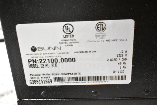 Bunn 22100.0000 G3 HD Black Bulk Coffee Grinder with label, model G3 HD, 3 lb. capacity, 1320W, assembled in USA.