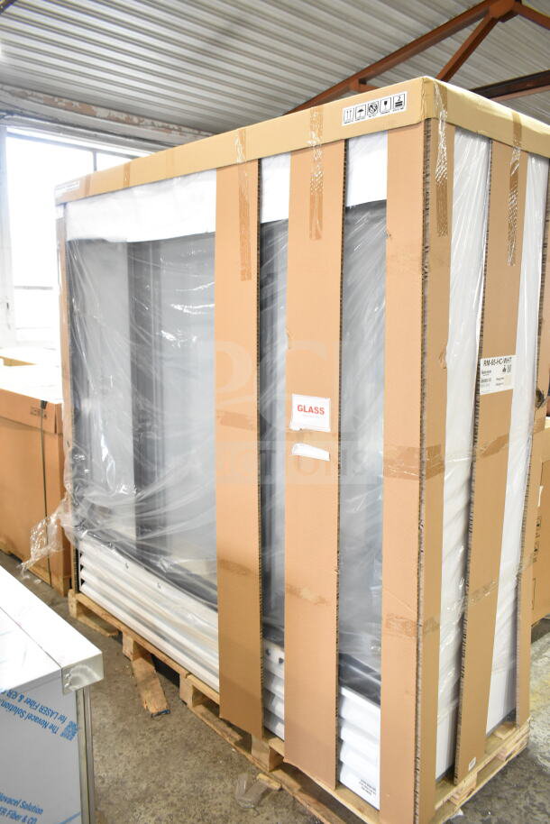 Brand new scratch and dent 2024 Hoshizaki RM-65-HC-WHT 78" glass door merchandiser, three-section, in packaging.