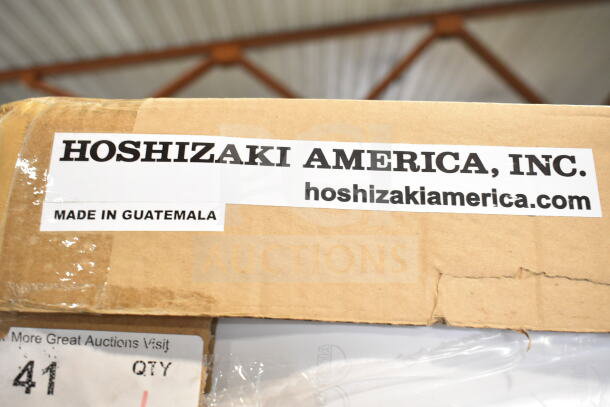 Brand new Hoshizaki RM-65-HC-WHT 78" glass door merchandiser box with "Made in Guatemala" label.
