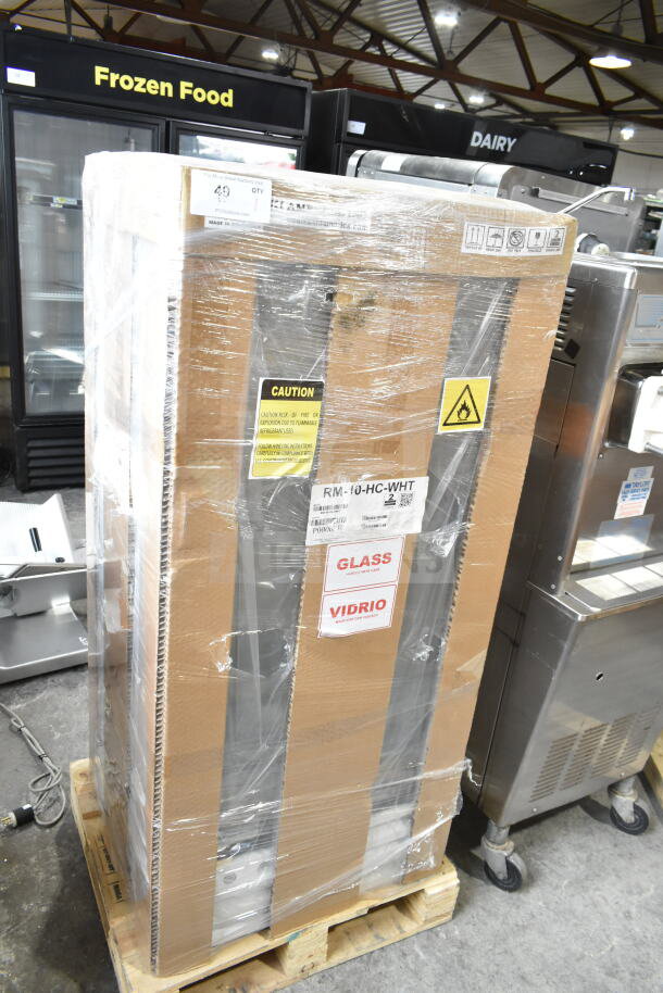 Brand new 2024 Hoshizaki RM-10-HC-WHT glass door refrigerator in packaging. Scratch and dent model, 115V, 1 phase.