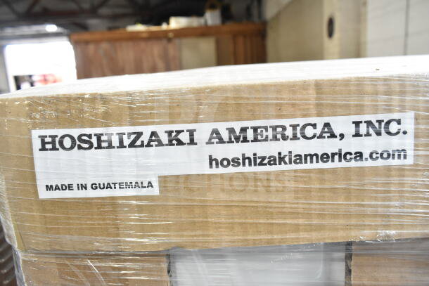 "Brand new 2024 Hoshizaki RM-10-HC-WHT refrigerator packaging, marked 'Hoshizaki America, Inc.', 'Made in Guatemala'."