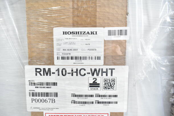 Brand new Hoshizaki RM-10-HC-WHT refrigerator with glass door. Scratch and dent condition, 115 Volts, 1 Phase. Visible labels.