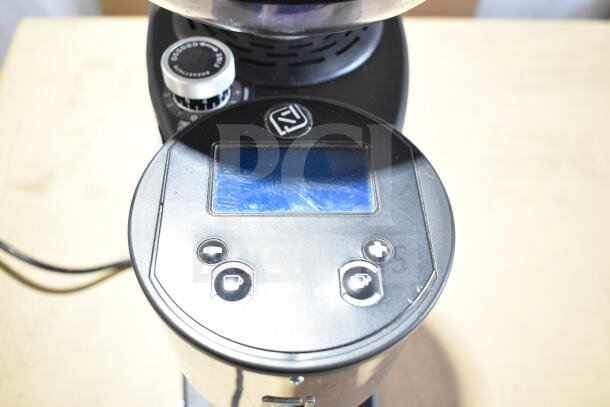 Nuova Simonelli G60OD espresso grinder, 1 lb. capacity. Features digital display, grind adjustment dial. 110V, 1 Phase.