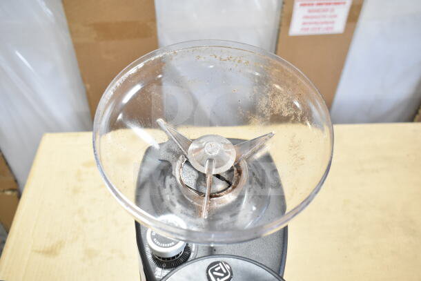 Nuova Simonelli G60OD espresso grinder, used condition; clear hopper, grind adjustment dial visible; 110V, 1 lb. capacity.