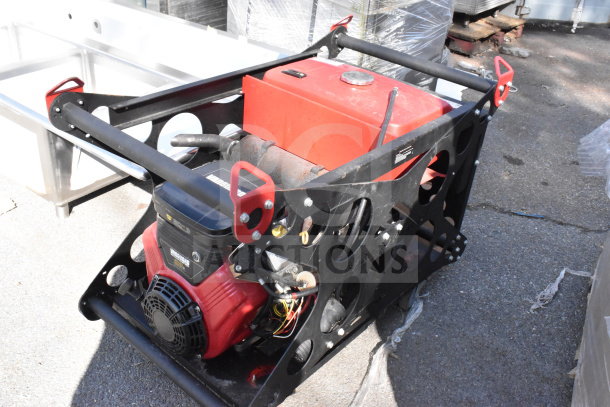 Briggs & Stratton Vanguard XTP120 Generator, 3 Phase, red and black, sturdy frame, in used condition.