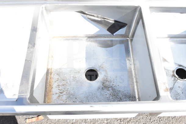 Brand new Regency 600S32424218 3 bay sink, scratch and dent, dual drain boards, no legs, visible tape.