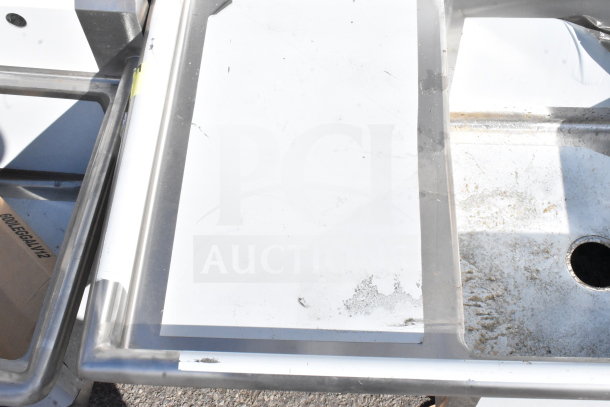 Regency 600S32424218 commercial 3-bay sink with dual drain boards, scratch and dent condition, no legs included.