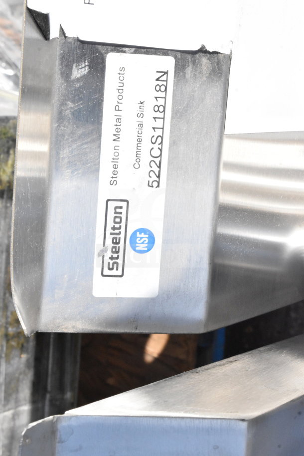 Steelton 522CS11818N stainless steel commercial sink, 18-gauge, 18"x18"x12" bowl, new with scratches and dents, NSF certified label.