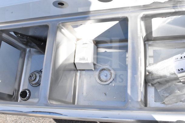 Regency 600S31416212 commercial 3 bay sink with dual drain boards, stainless steel, brand new with minor scratches and dents.