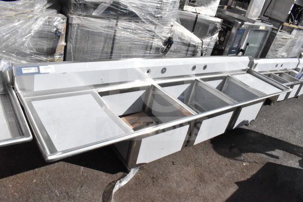 BRAND NEW SCRATCH AND DENT Regency 600S32424224 commercial 3-bay sink, dual drain boards, stainless steel, brand visible.