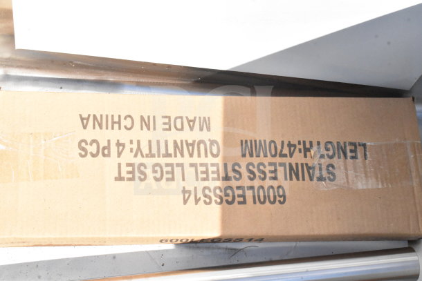 Cardboard box labeled "600LEGSS14," containing Regency 600S32424224 commercial 3 bay sink parts. Box indicates "stainless steel leg set, quantity: 4 pcs, length: 470mm, made in China."