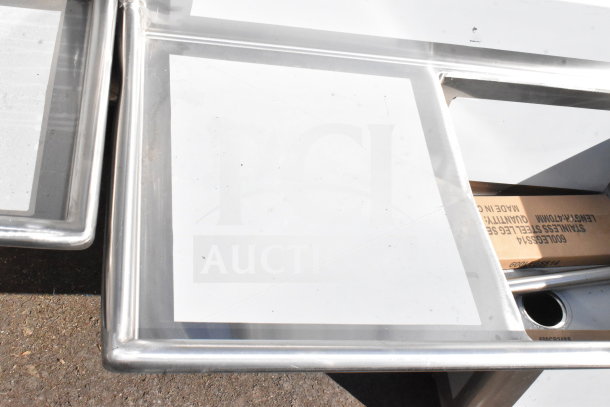 BRAND NEW Regency 600S32424224 3-bay commercial sink, stainless steel, with dual drain boards; scratch and dent condition.