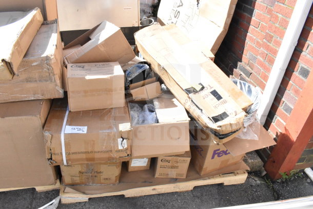 14 brand new scratch and dent items on a pallet, including melamine plates and table base. Various boxes, unopened.
