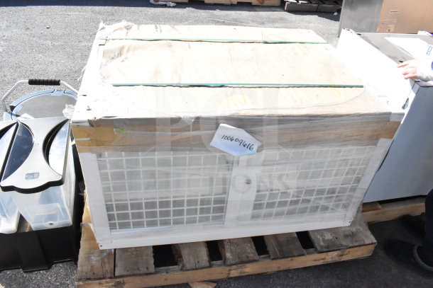 BRAND NEW SCRATCH AND DENT! Security Case 35352944C052 in crate on pallet, slight exterior damage, label reads "100609616."