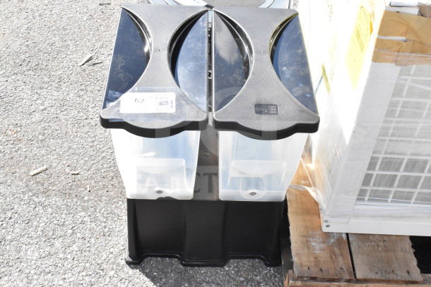 Brand new double beverage holder dispenser, scratch and dent, black top with clear containers, tag showing "62/299 QTY."