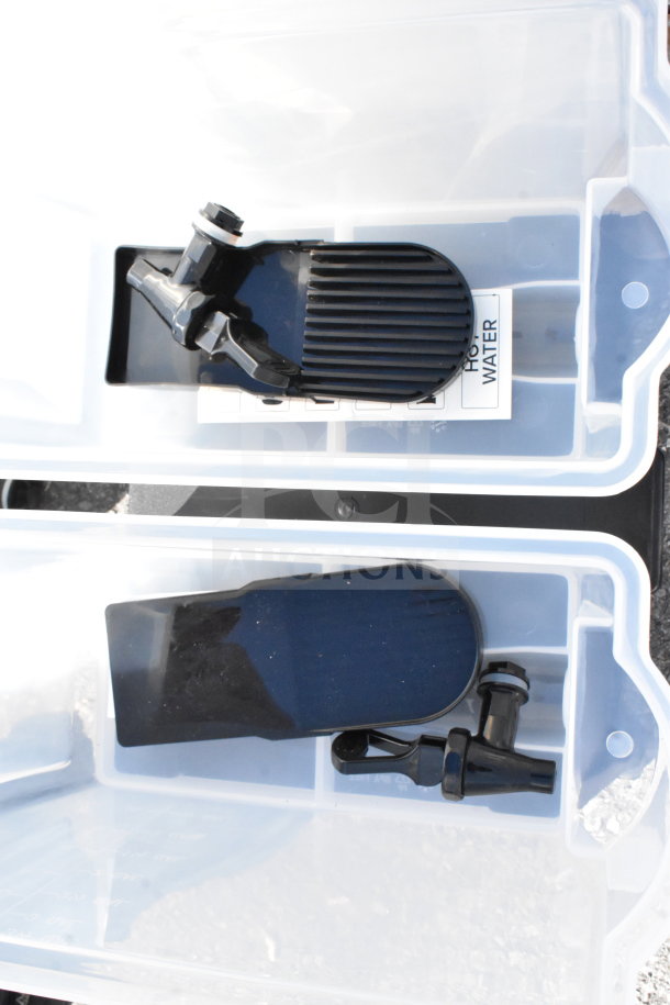 Brand new scratch and dent countertop double beverage holder dispenser, white with black taps, labeled for hot water.
