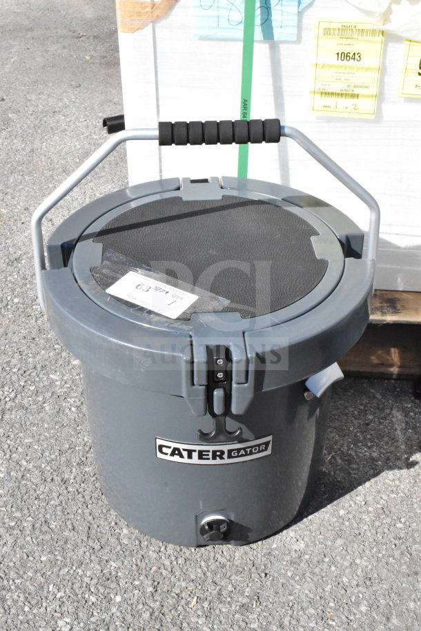 Brand new, scratch and dent, CaterGator CCG20CHR charcoal 20 Qt. rotomolded outdoor cooler with label visible.