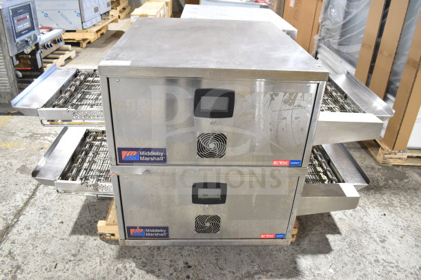 Middleby Marshall CTX DZ33T stainless steel conveyor pizza ovens, 208V, 3/1 phase, tested and working, on commercial casters.