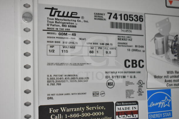 Label on True GDM-49 Commercial Cooler. Displays model, voltage, serial number, patents, and energy certification.