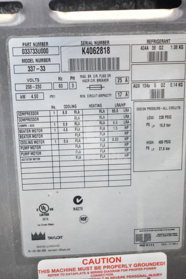 Taylor 337-33 Soft Serve Machine label, 2 flavors plus twist, 208/230V, 3 phase, detailed electrical specs and branding.
