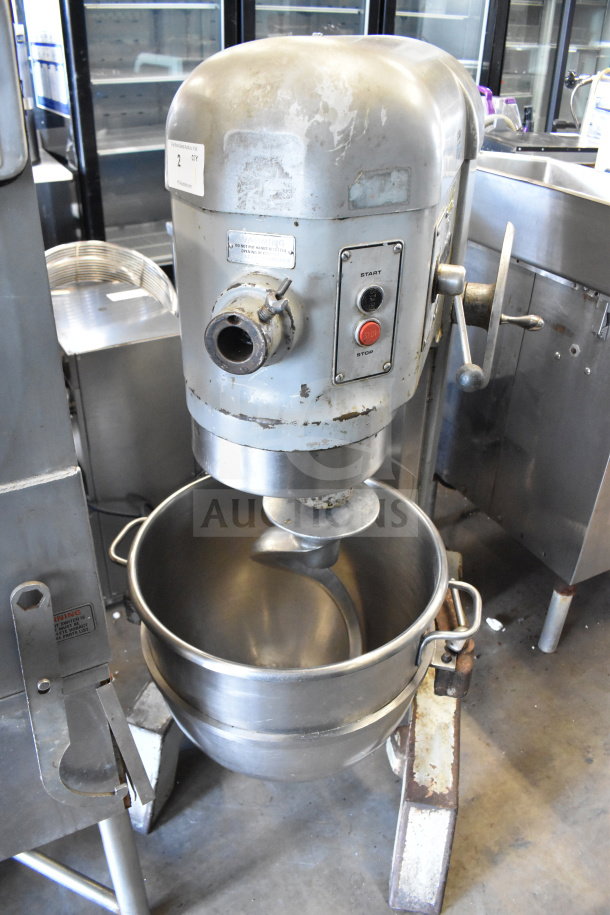 Hobart H 600 commercial 60-quart dough mixer, includes bowl and hook, 200V, visible wear, start/stop button on panel.