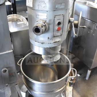 Hobart H 600 commercial 60-quart dough mixer, includes bowl and hook, 200V, visible wear, start/stop button on panel.