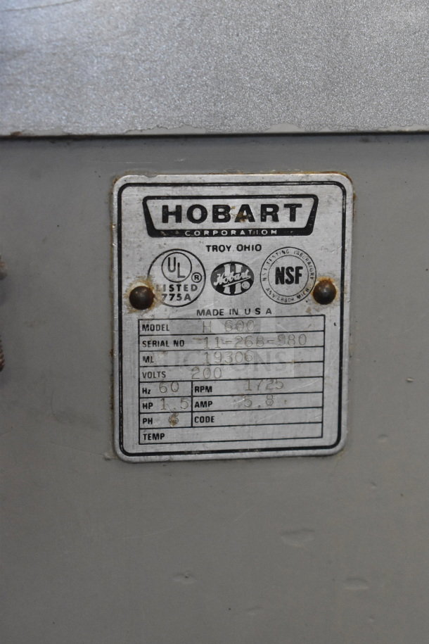 Hobart H 600 Commercial 60 Qt Mixer, 200V, with bowl and dough hook. Model label shows specs including RPM and HP.