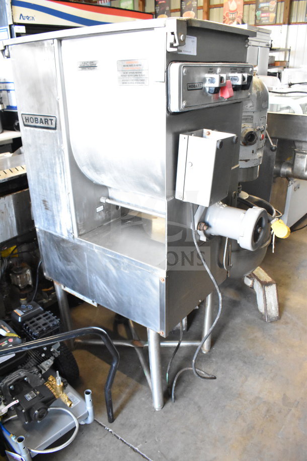 Hobart 4246 HD commercial meat grinder in good condition, 208V, 3 phase. Features durable stainless steel construction.