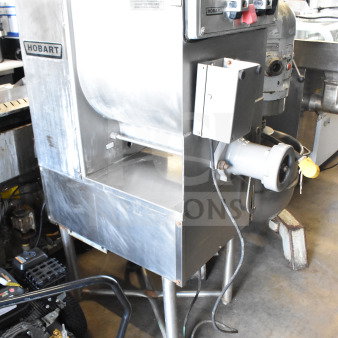 Hobart 4246 HD commercial meat grinder in good condition, 208V, 3 phase. Features durable stainless steel construction.