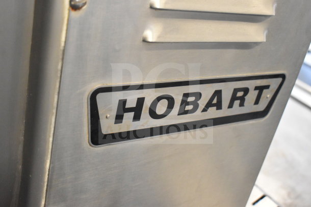 Hobart 4246 HD commercial meat grinder, stainless steel, 208V, 3 phase, floor style, brand logo visible.